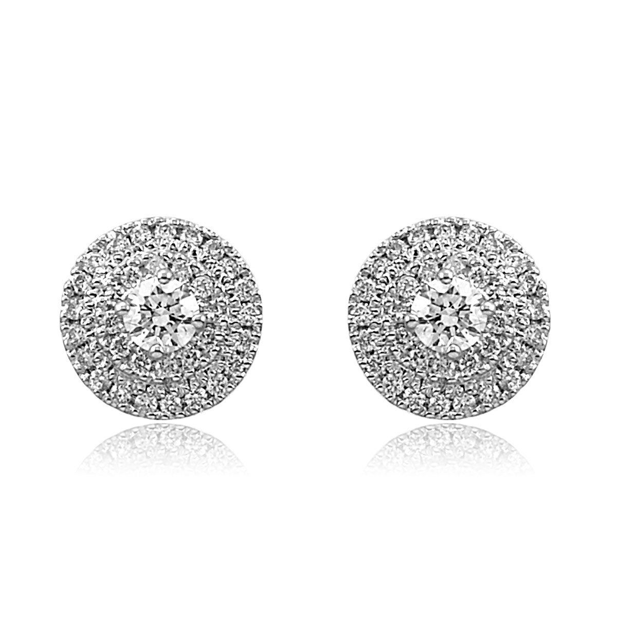 Pair of diamond stud earrings in platinum