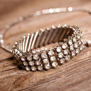 Diamond bracelet resting on wood
