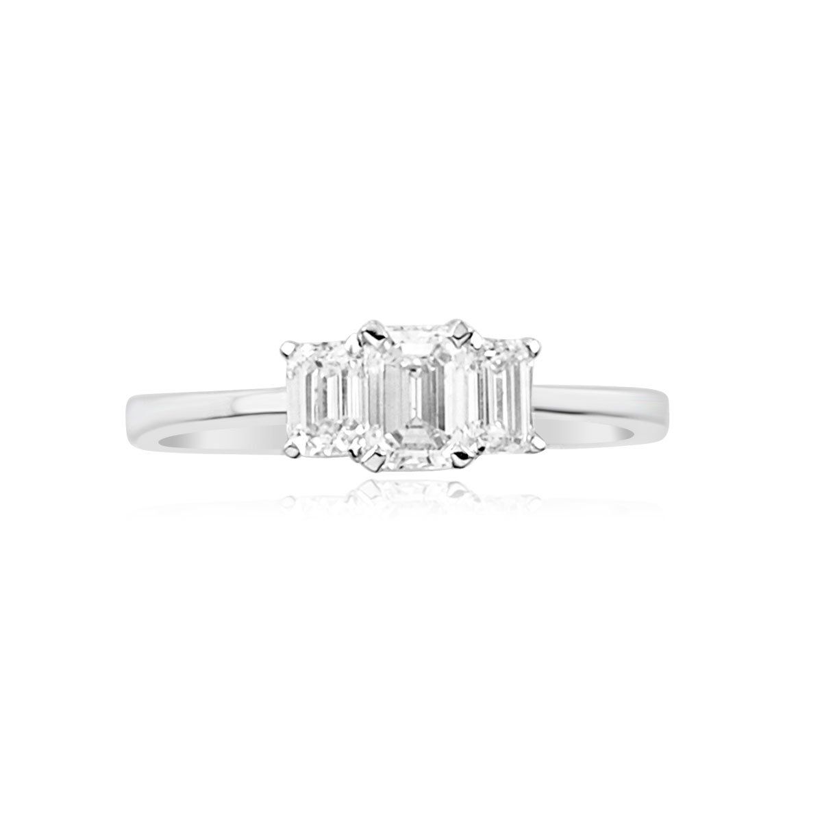 Emerald-cut diamond three-stone ring in platinum