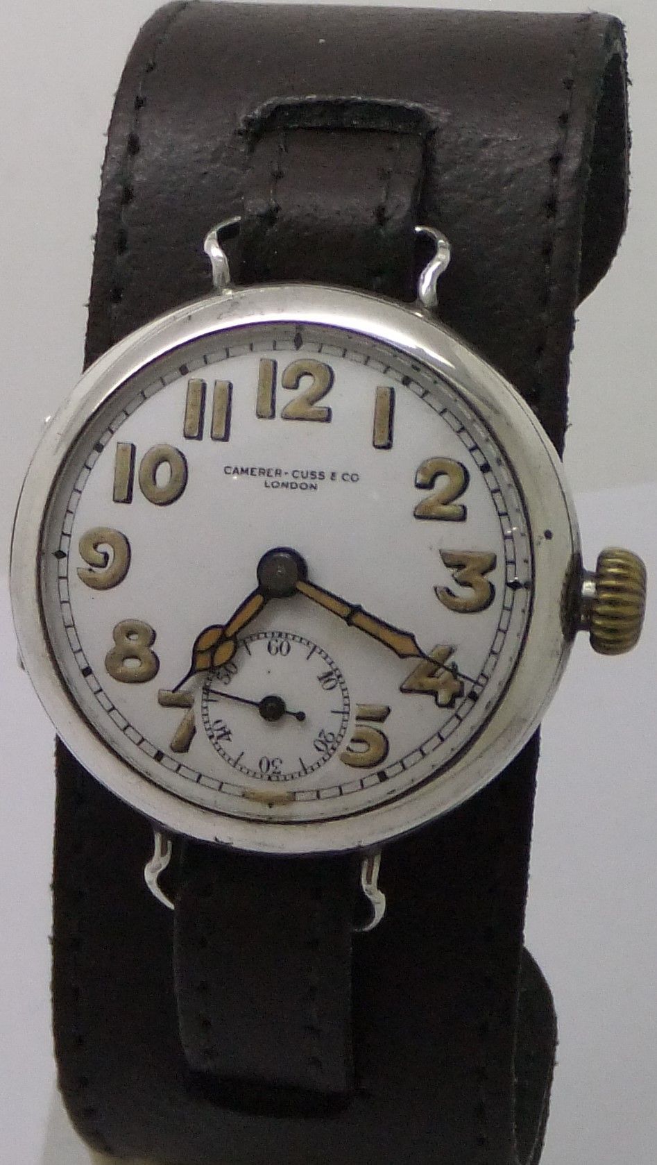 1915 silver trench watch by Camerer Cuss and Co.